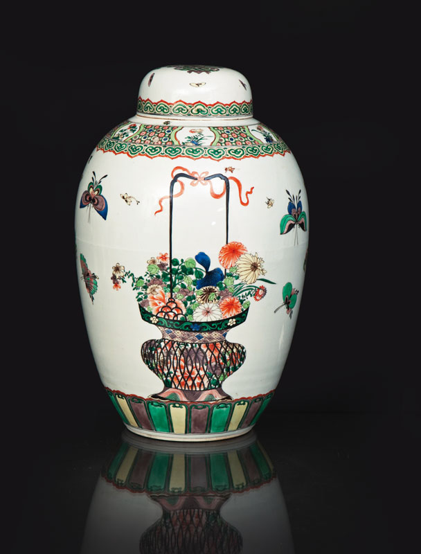 A tall 'Famille Verte' cover vase with flower baskets