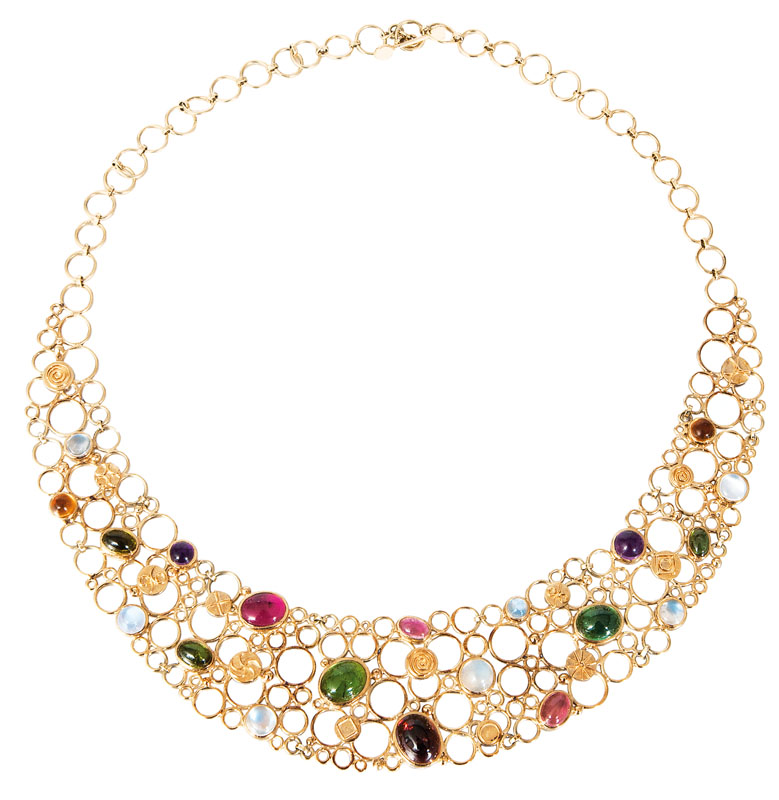 A tourmalilne moonstone topaz jewelry set with necklace and bracelet