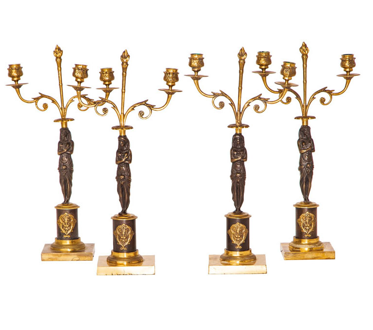 A rare set of 4 candelsticks of Empire style