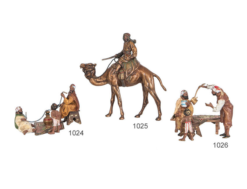 A Vienna bronze 'Mocha drinking Arabs group' by Bergmann
