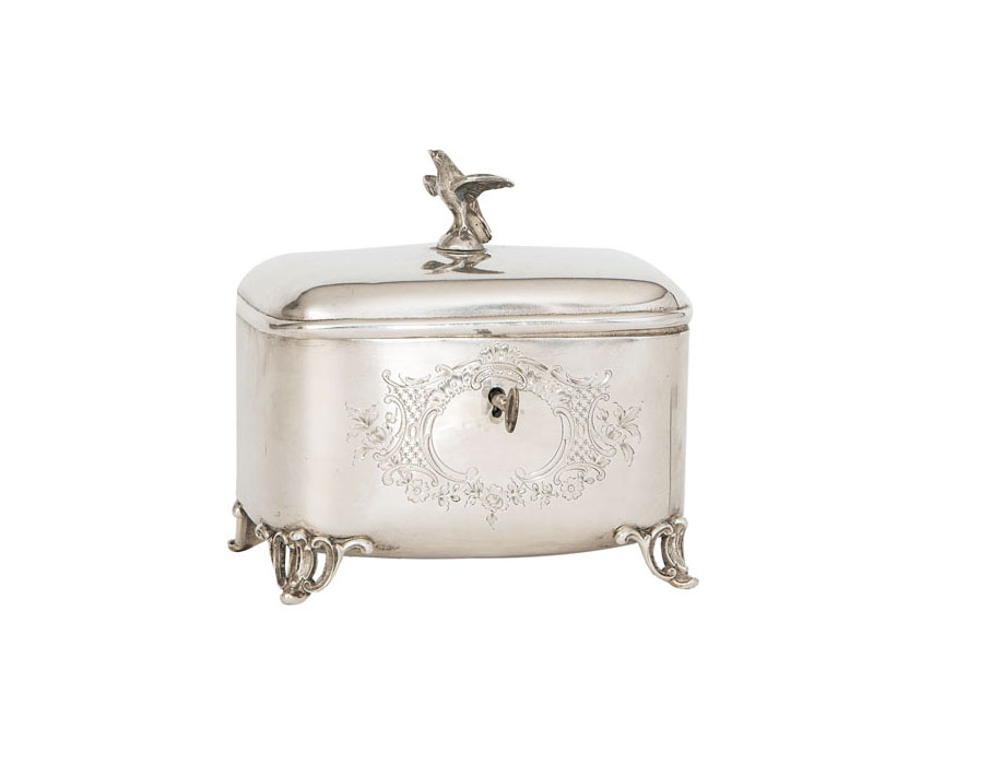 A sugar box with engraved Rococo pattern