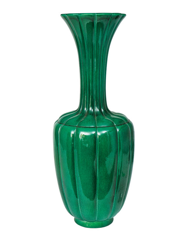 A tall floor vase with lobed wall