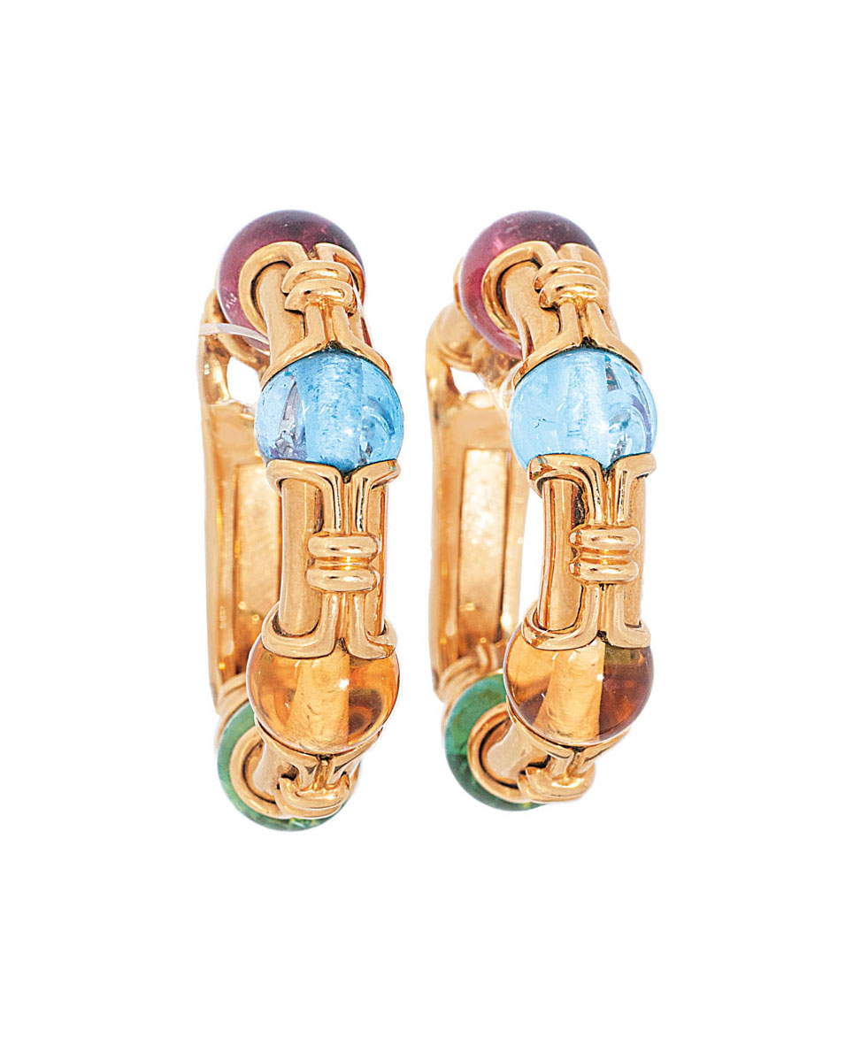 A pair of earrings with precious stones by Bulgari
