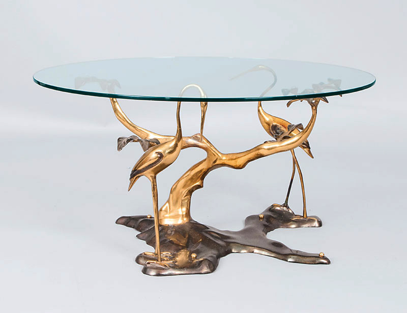 A modern couch table with egret figures