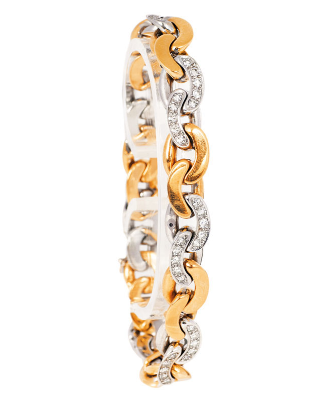 A golden bracelet with diamond setting