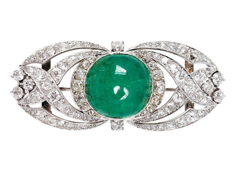 An Art Déco emerald brooch with diamonds