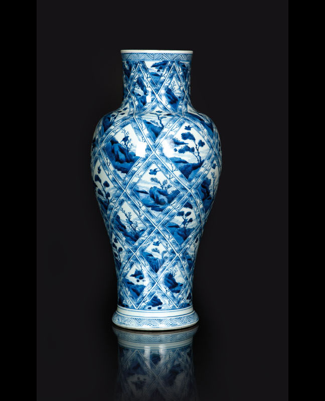 An exceptional lidded vase with pine-decoration