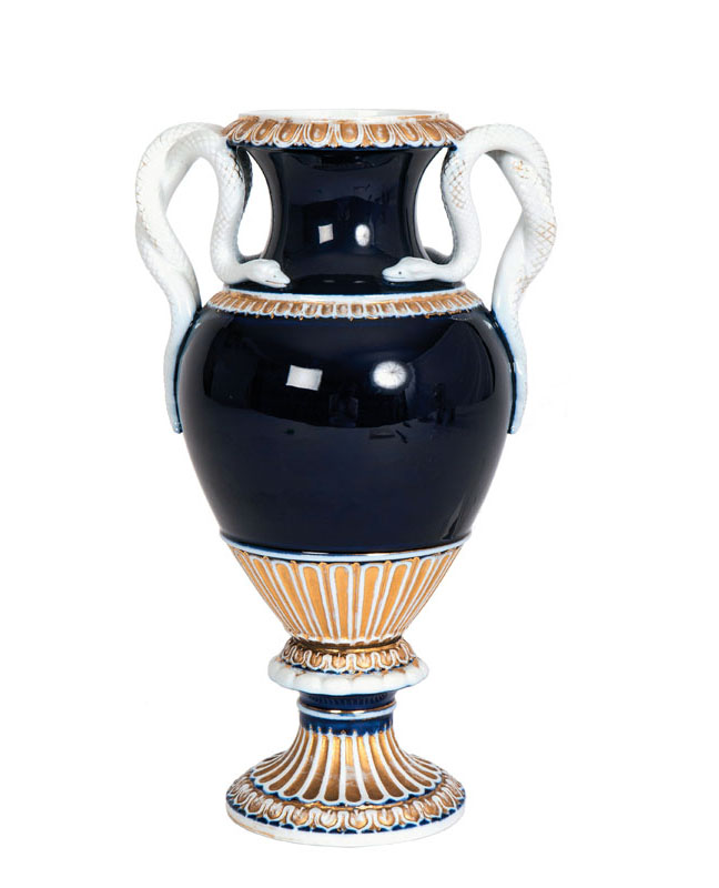 A cobalt blue grounded vase with snake-formed handles