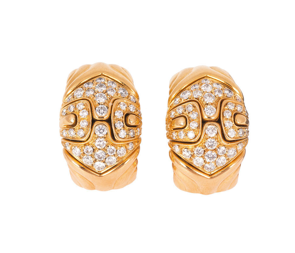 A pair of diamond earclips by Bulgari