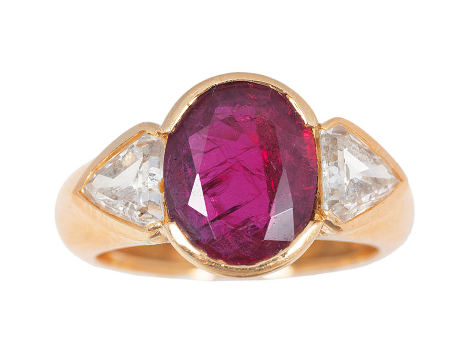 A diamond gold ring with synthetical ruby