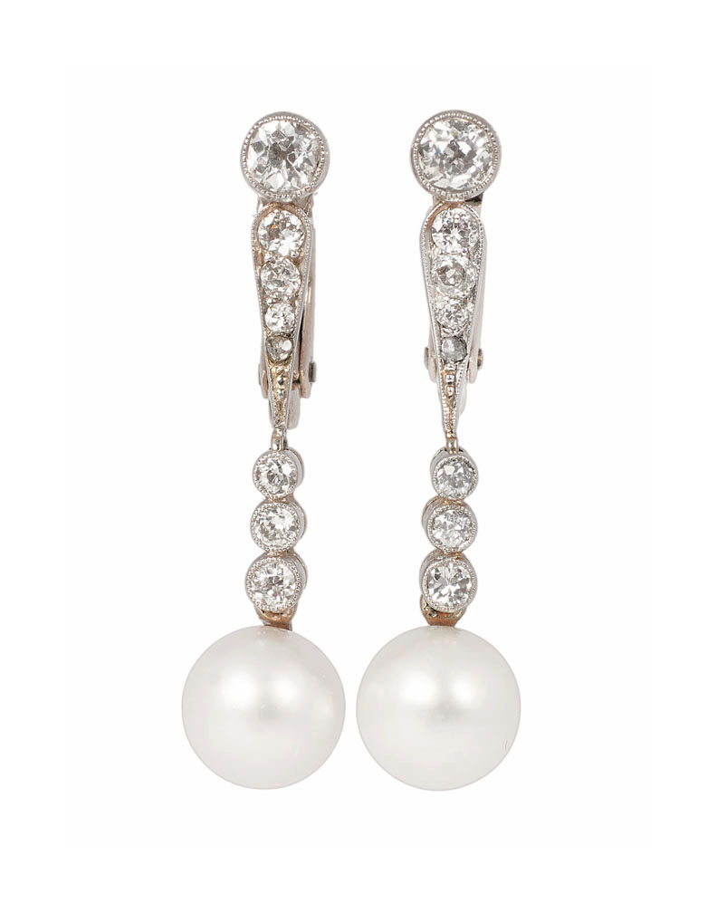 A pair of diamond natural pearl pendants
