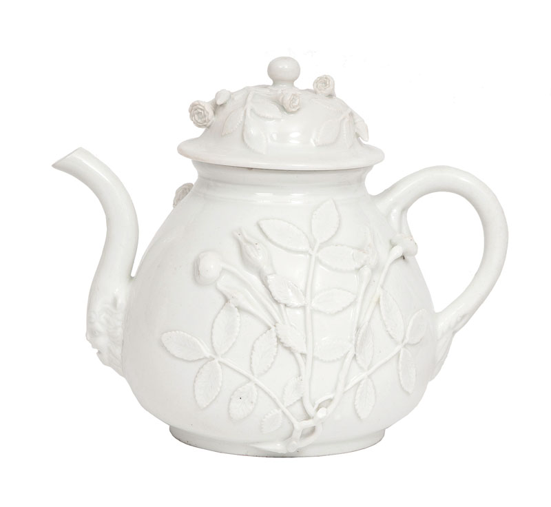 A tea pot with leaf-relief