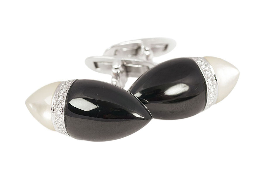 A pair of onyx mother-of-pearl cufflinks with diamonds