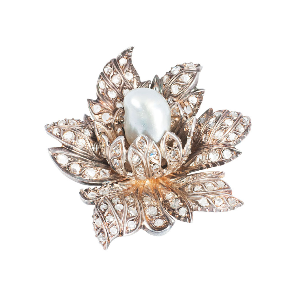 An antique french diamond brooch with pearl