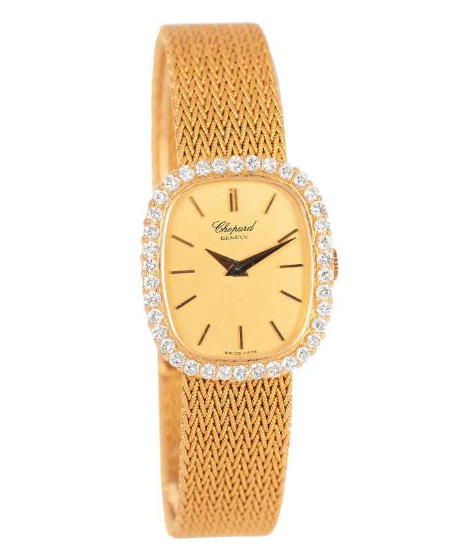 A ladie's wrist watch by Chopard with diamonds