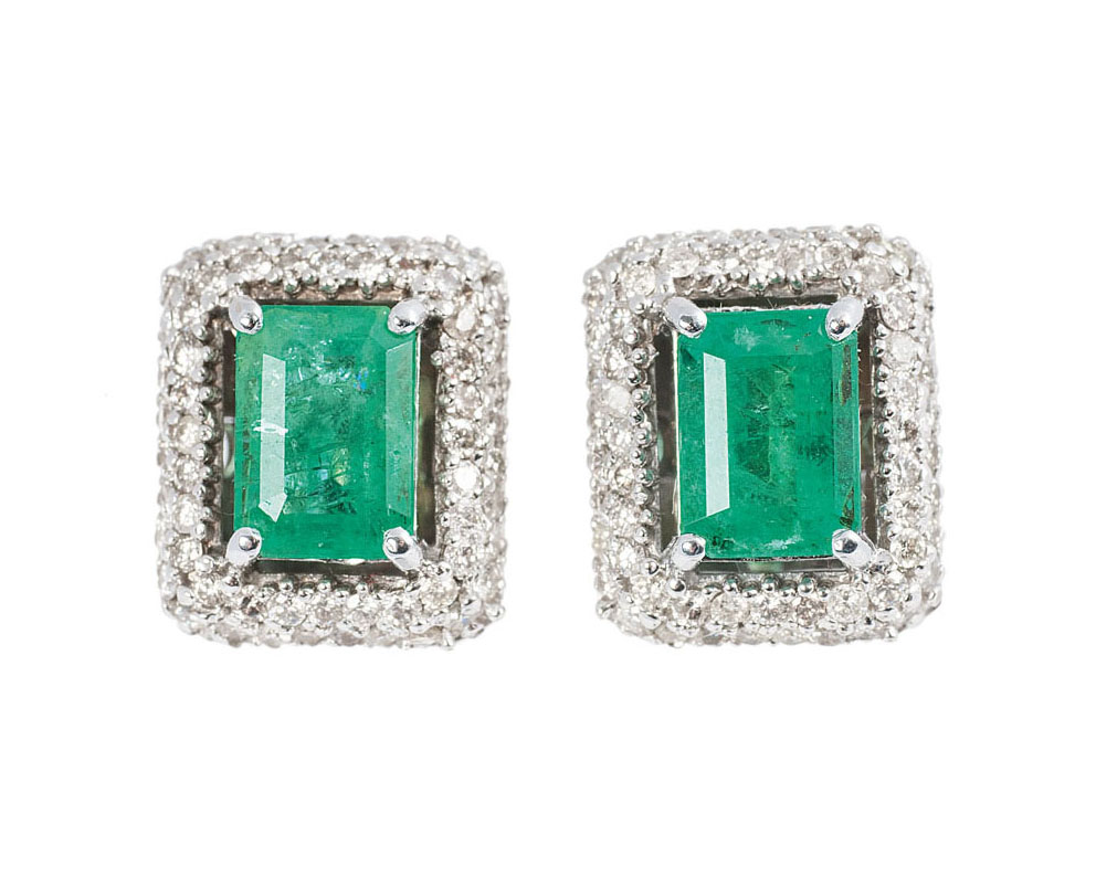 A pair of emerald diamond earstuds A pair of emerald diamond earstuds