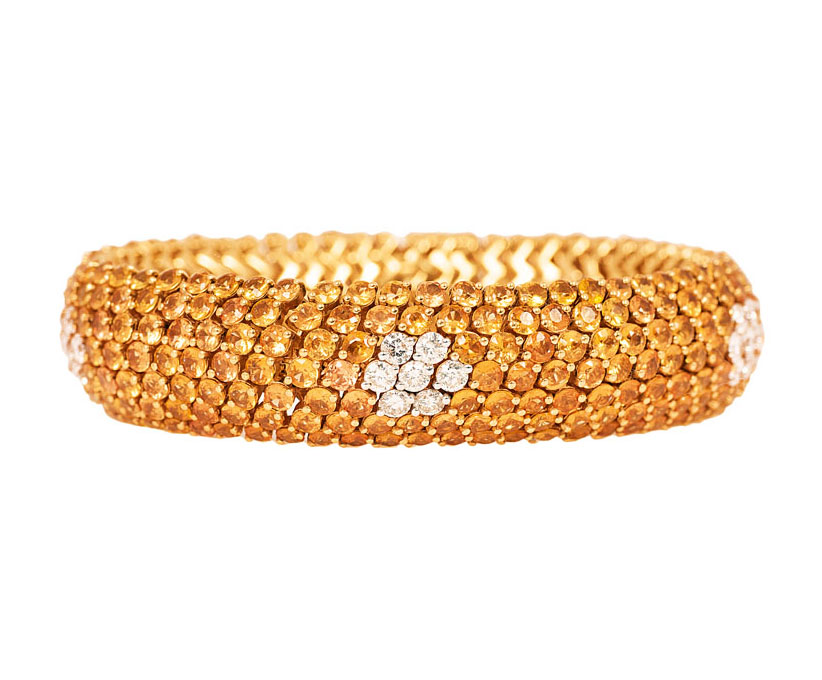 A highcarat yellow sapphire bracelet with diamonds