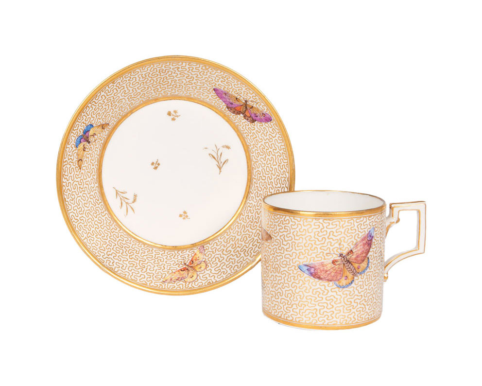 A Berlin Empire-style cup with butterfly-decor A Berlin Empire-style cup with butterfly-decor