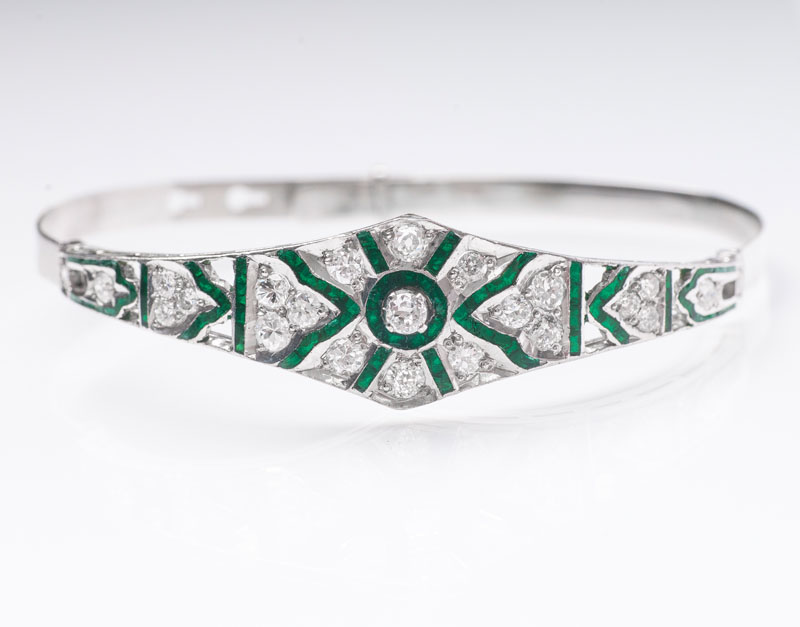A diamond bangle bracelet with green glass setting in Art-Déco style