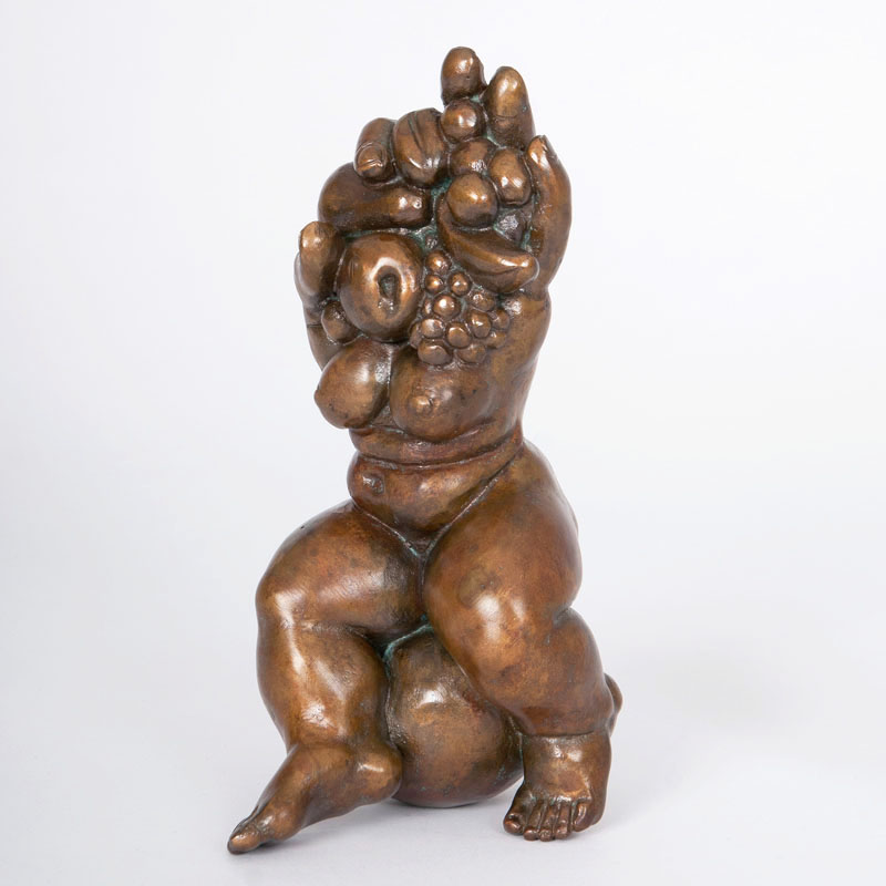 A small bronze figure 'Fruit dealer'