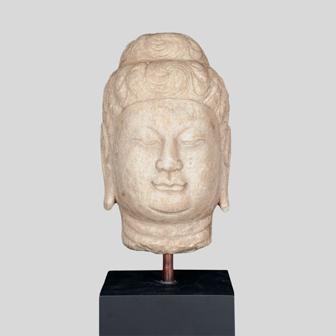 A rare and magnificent marble buddha head
