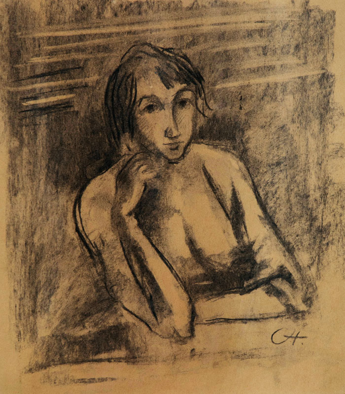 Woman sitting at a Table