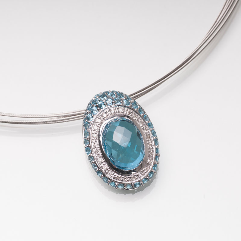 A topaz diamond pendant with necklace
