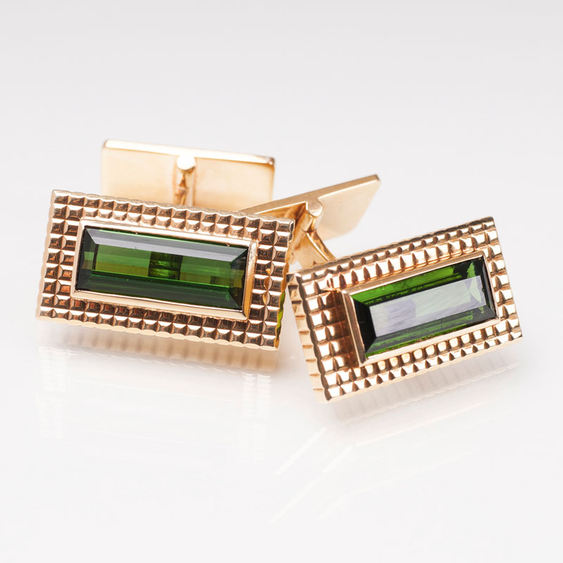 A pair of cufflinks with tourmaline