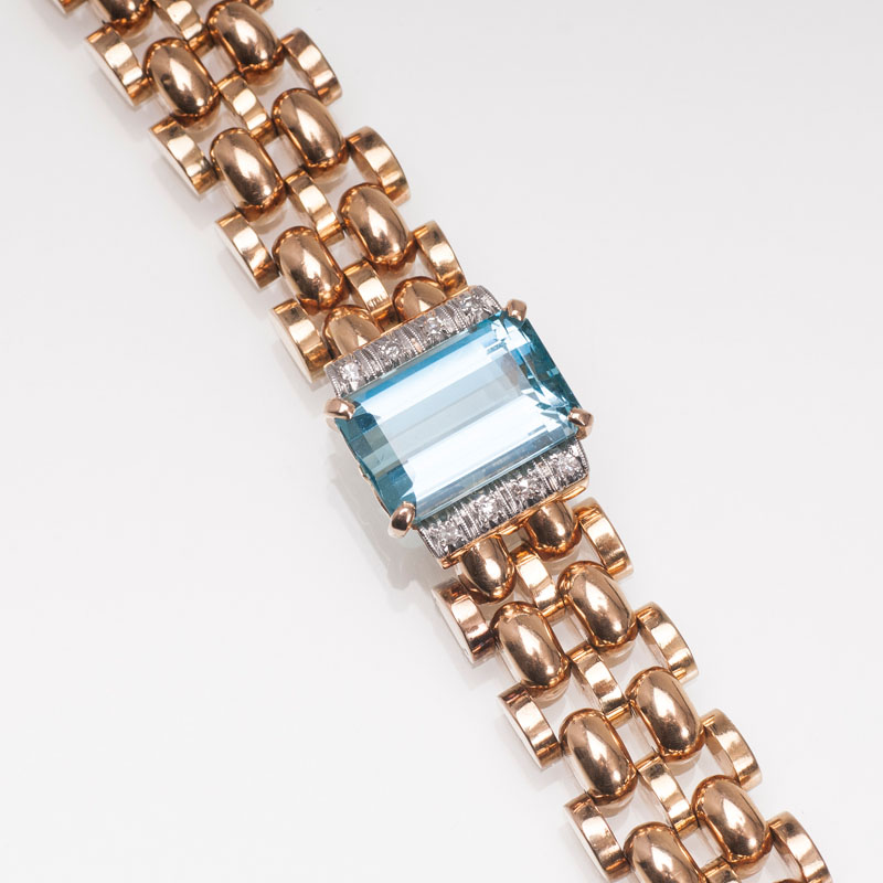 A golden bracelet with aquamarine