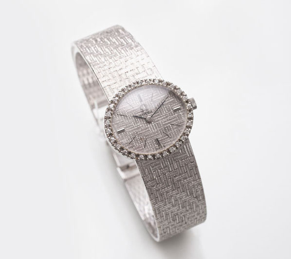 A ladie's wrist watch by Omega with diamonds
