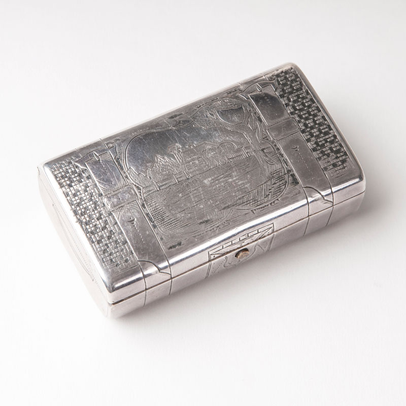 A russian cigarette case with engraving-decor