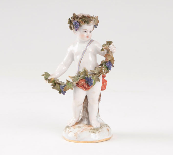 A porcelain figure 'putto as an allegory of the autumn'