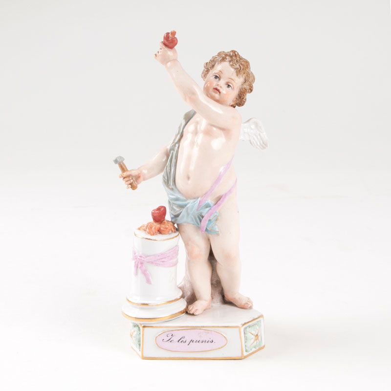 A porcelain figure 'motto' child 'Je les punis'