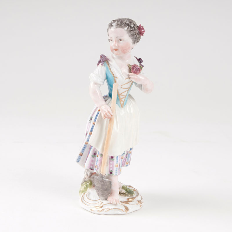 A porcelain figure 'little gardener with spade'