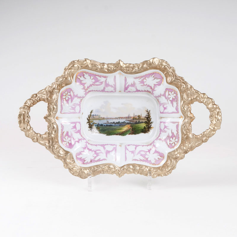 A small bowl with handles and view of Dresden