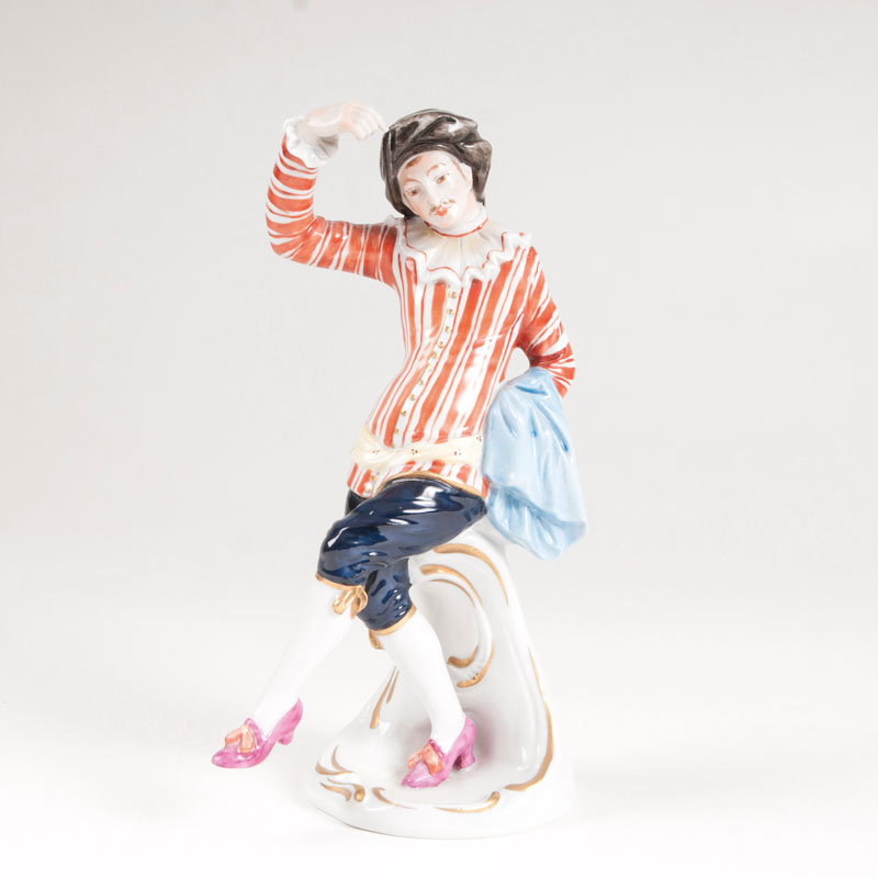 A porcelain figure 'harlequin' from the Italian Comedy