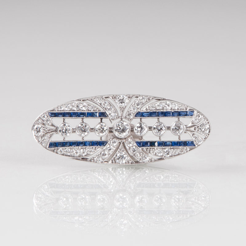 An Art Déco diamond sapphire brooch