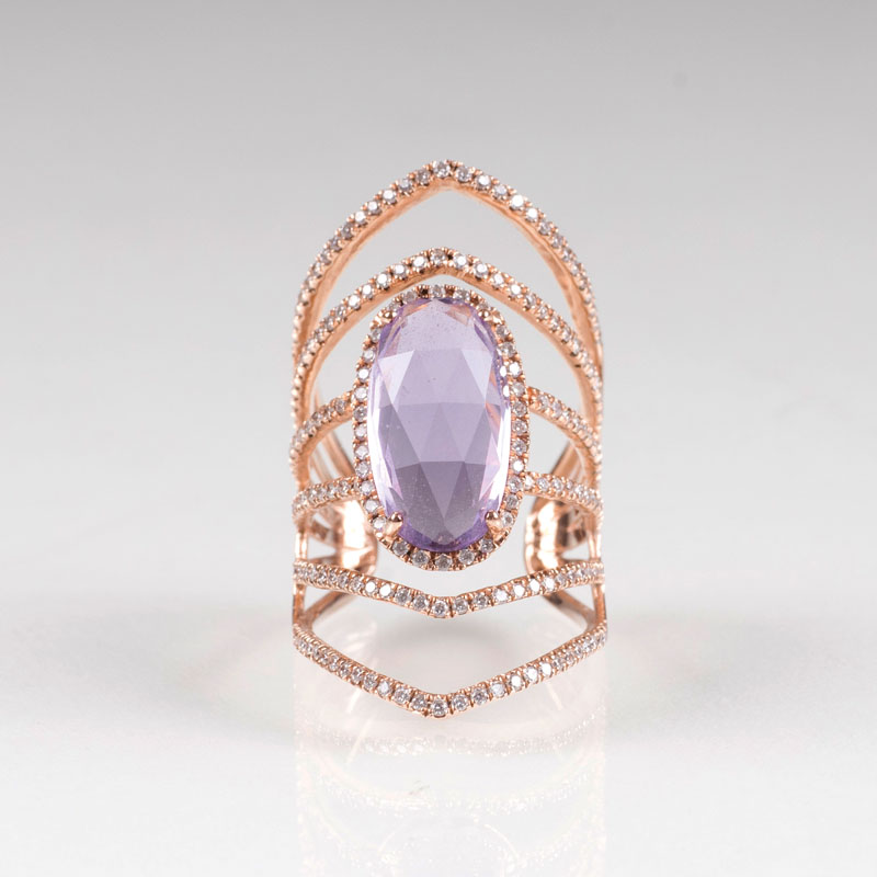 A modern, delicate diamond amethyst ring