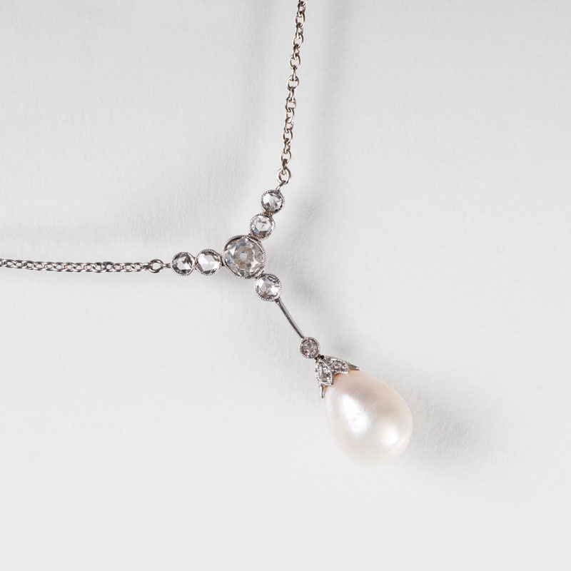 An Art Nouveau pendant with natural pearl and diamonds