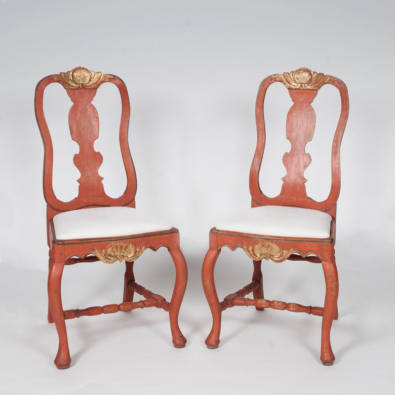 A pair of pompejan-red painted Baroque chairs