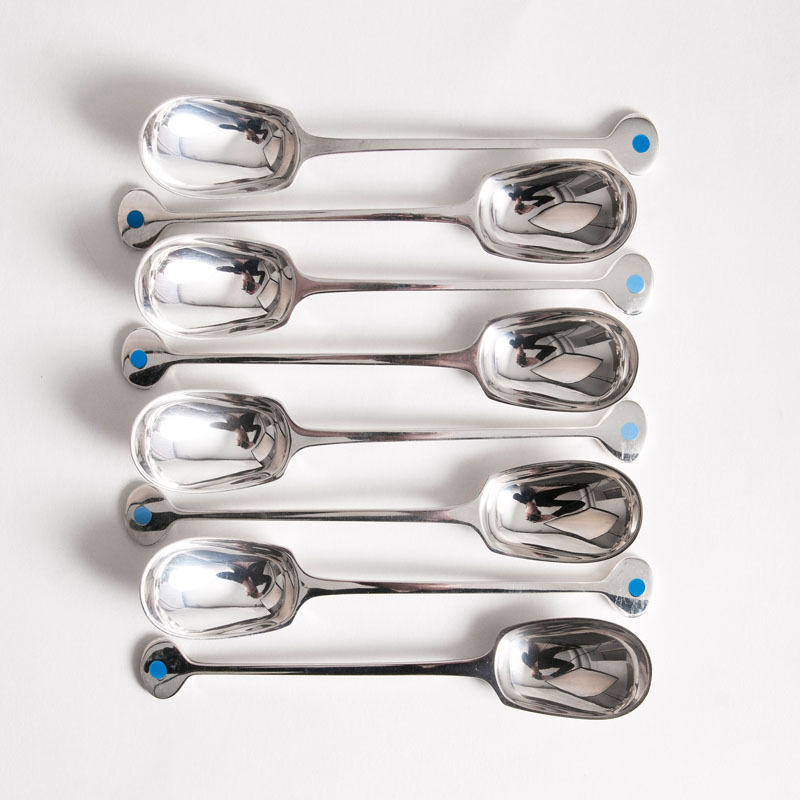 A set of 8 designer dinner spoons