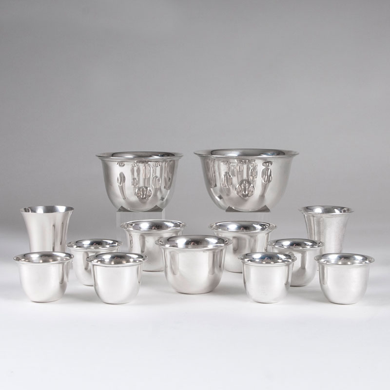 A set of 24 drinking vessels and bowls