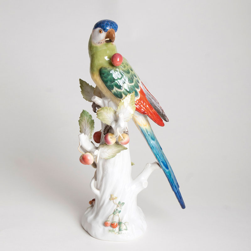 A porcelain figure 'Parrot with Cherries'