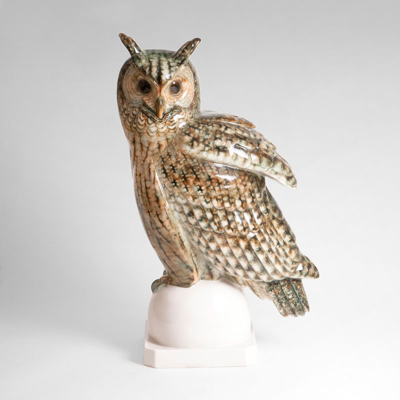 An impressive tall porcelain sculpture 'Sitting Eagle Owl'