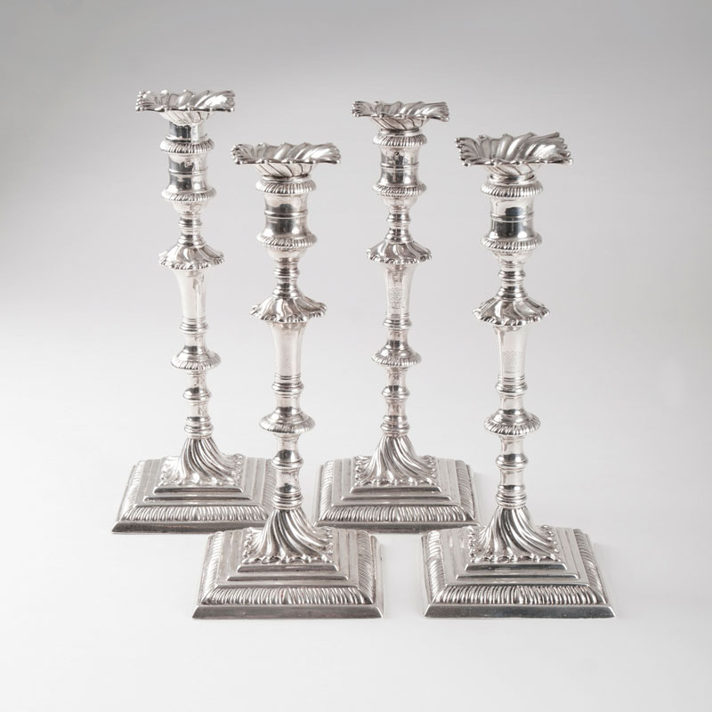 A set of four Georgian candlesticks