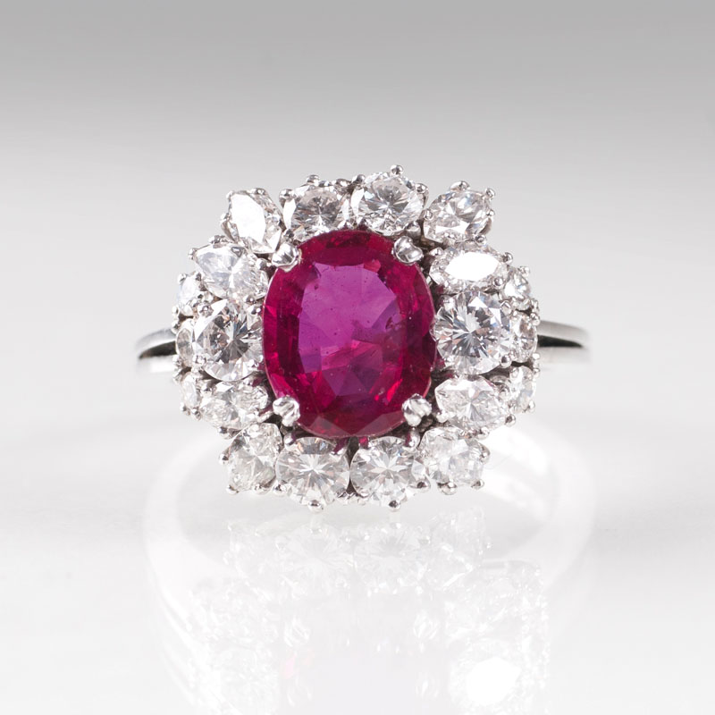 A diamond ring with a natural ruby
