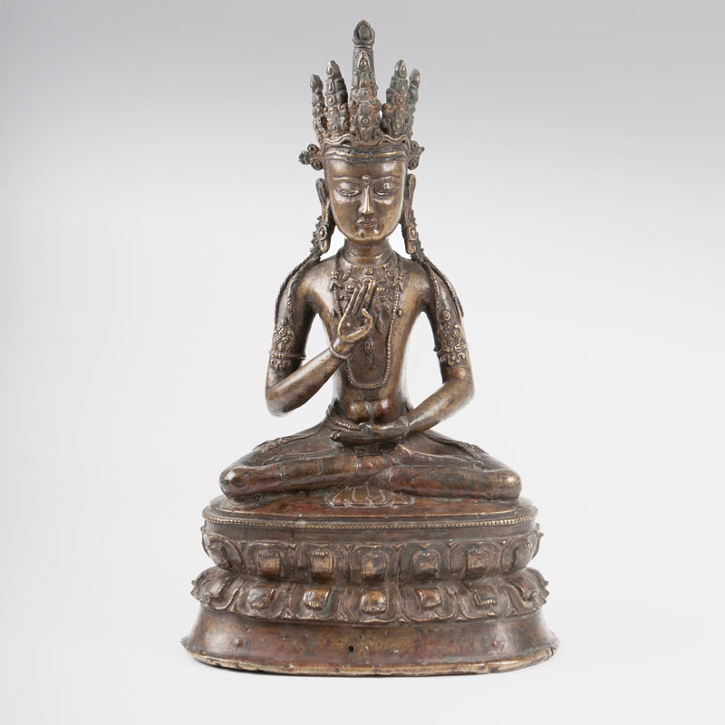 A bronze sculpture of Buddha Amoghasiddhi
