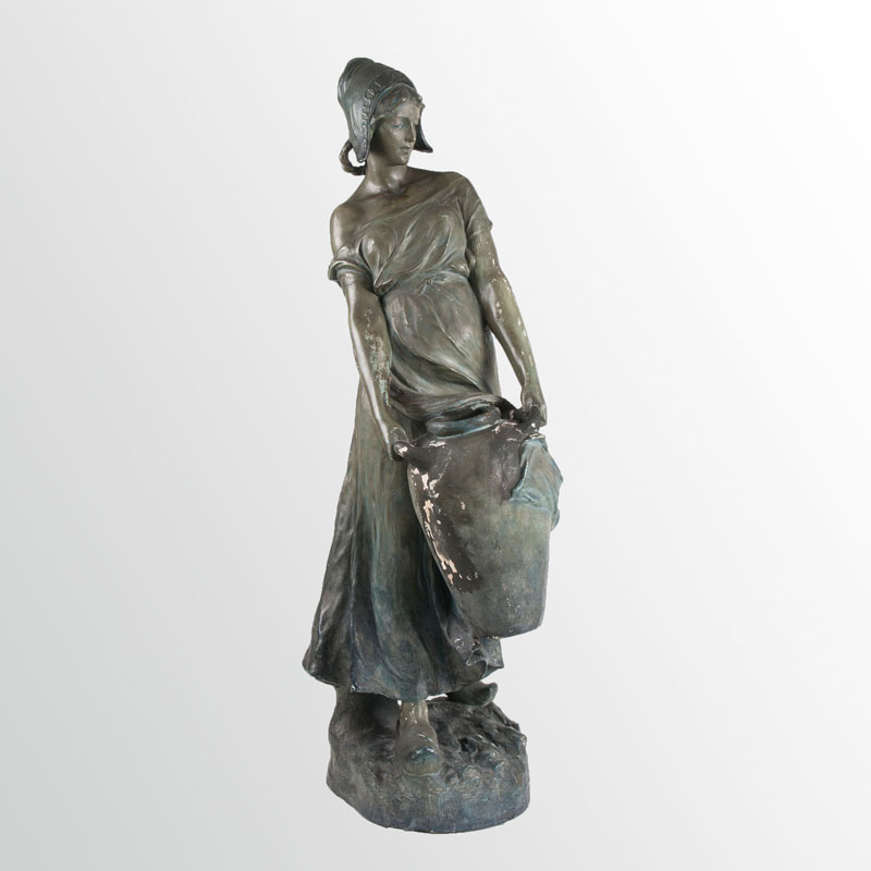 A Goldscheider figure 'Dutch girl holding a vase'