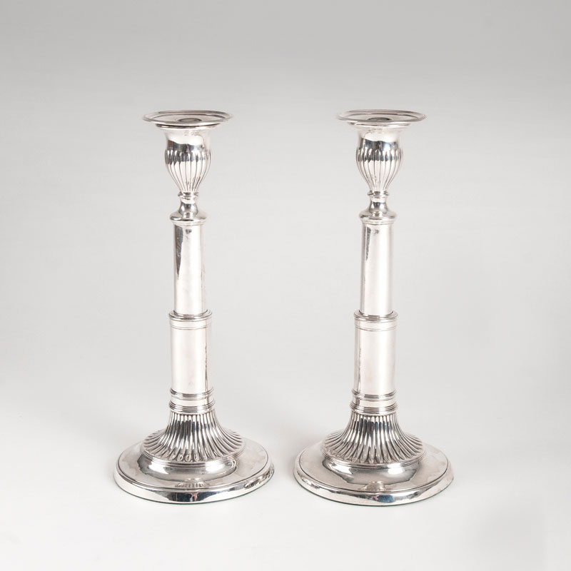 A pair of Georgian telescopic candlesticks