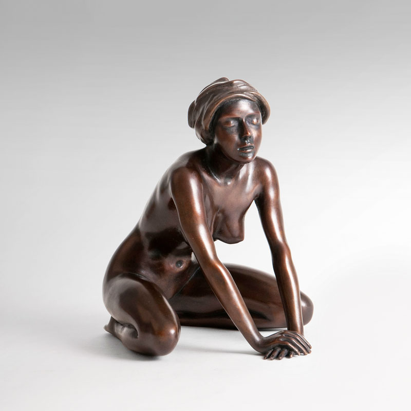 A bronze sculpture 'Girl with Headscarf'